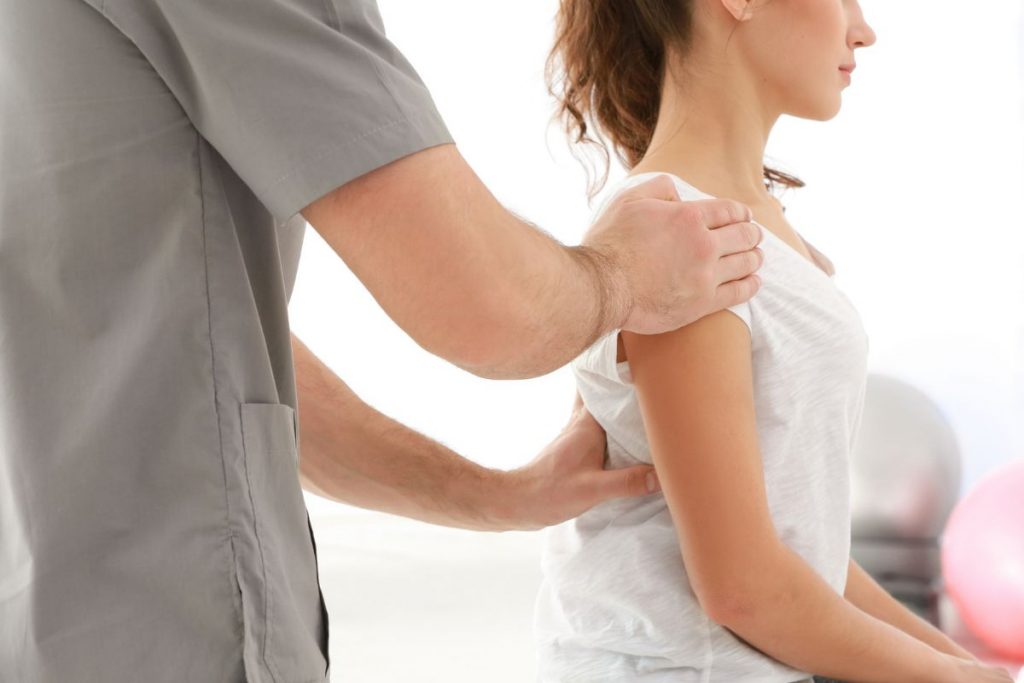 Mujer,doctor- Higiene postural