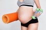 Mujer embarazada preparada para hacer ejercicio-Signos de alarma para detener el ejercicio si estás embarazada